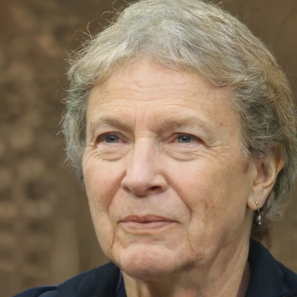 Portrait of Patricia W., a 68-year-old woman with short gray hair, who shares how her husband recovered his sight using the Canaan Honey Protocol